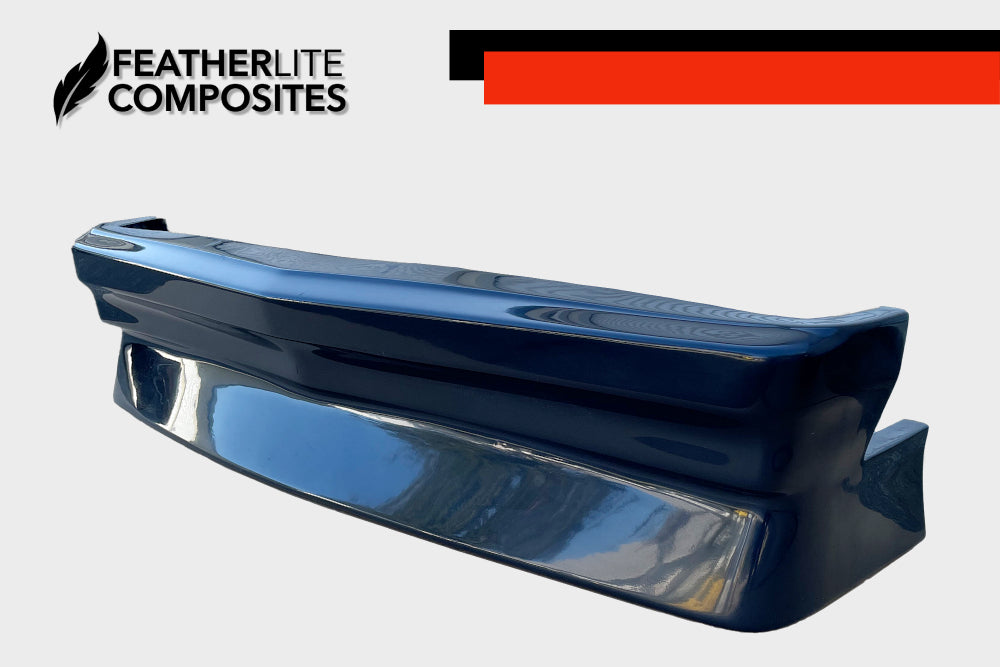 Black fiberglass front bumper for Malibu made by Featherlite Composites