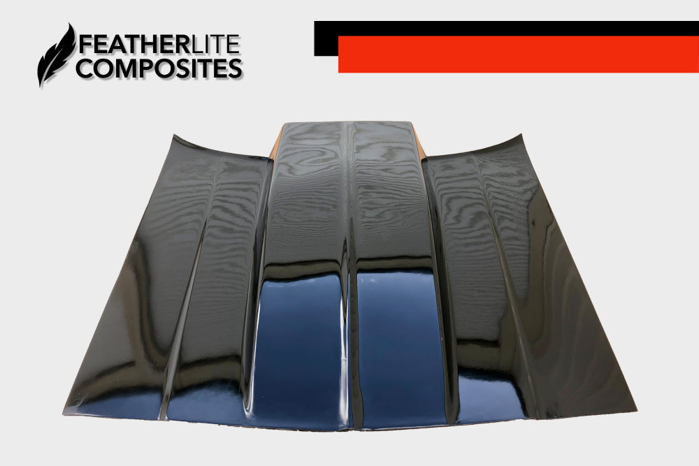Black Cutlass Hood made by Featherlite Composites. Made of fiberglass.